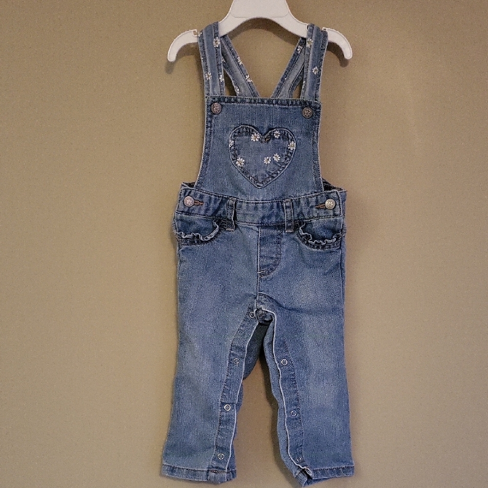 Super cute denim overalls with heart and ruffle detail